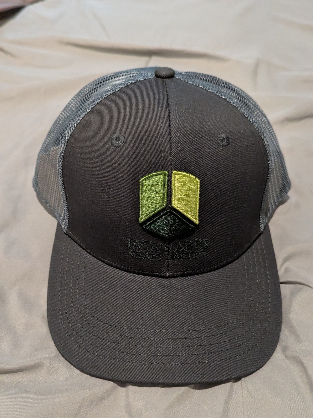 Black & Gray Jack's Abby Trucker Cap with Green Logo